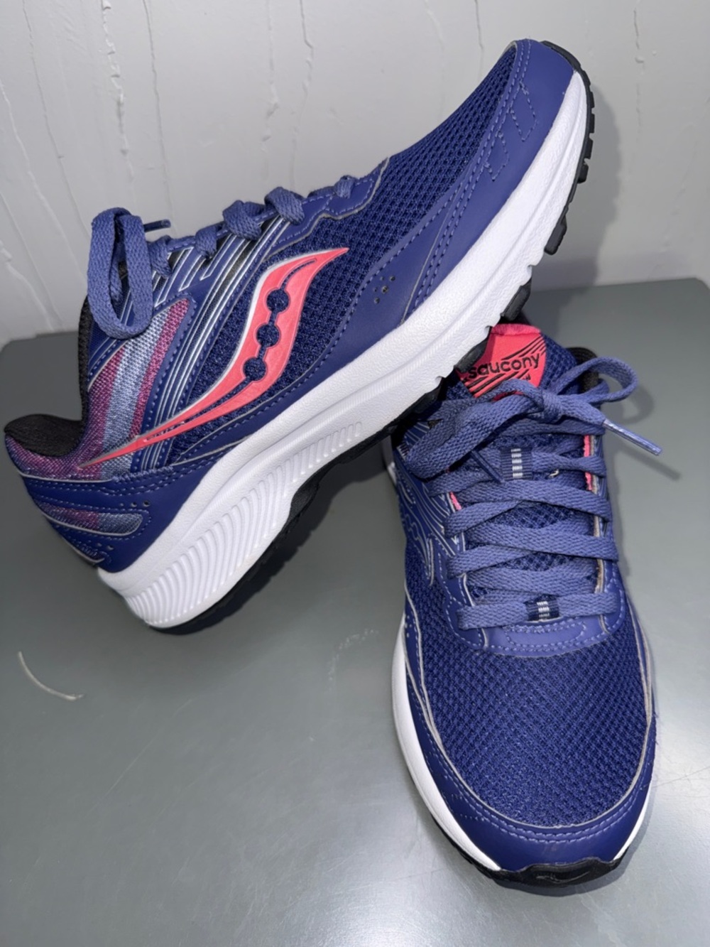 Saucony Women's Cohesion 15 in the "Cobalt/Punch Running Shoes Size 7
